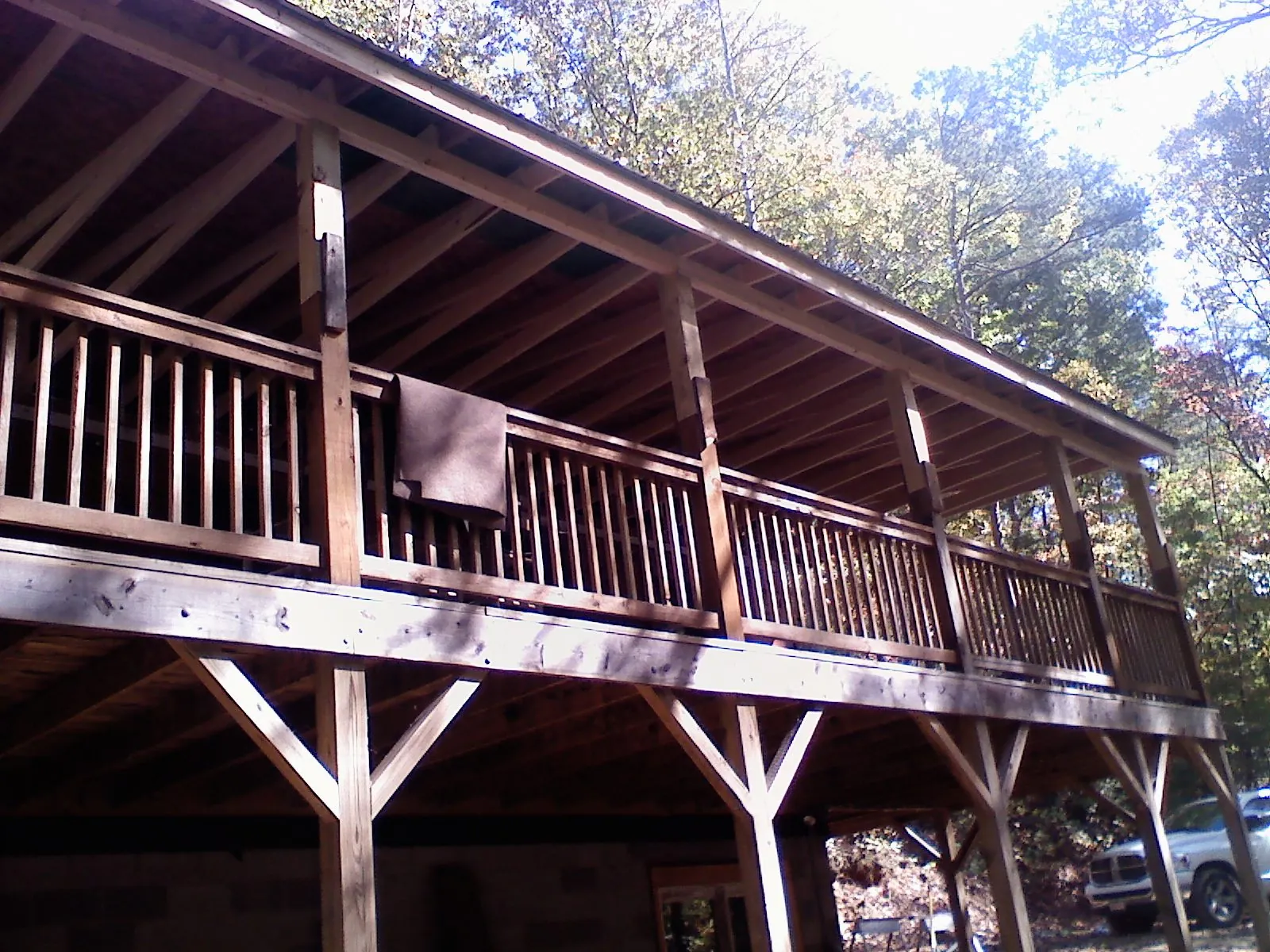 Timber framing under a new elevated porch and deck — Roof Leak Repair in Hamel by Roofing Brothers